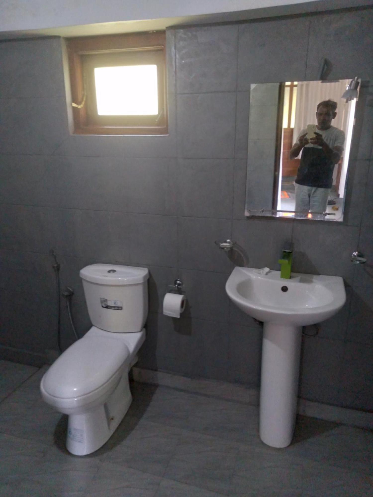 Home In The Island تانجالي الغرفة الصورة